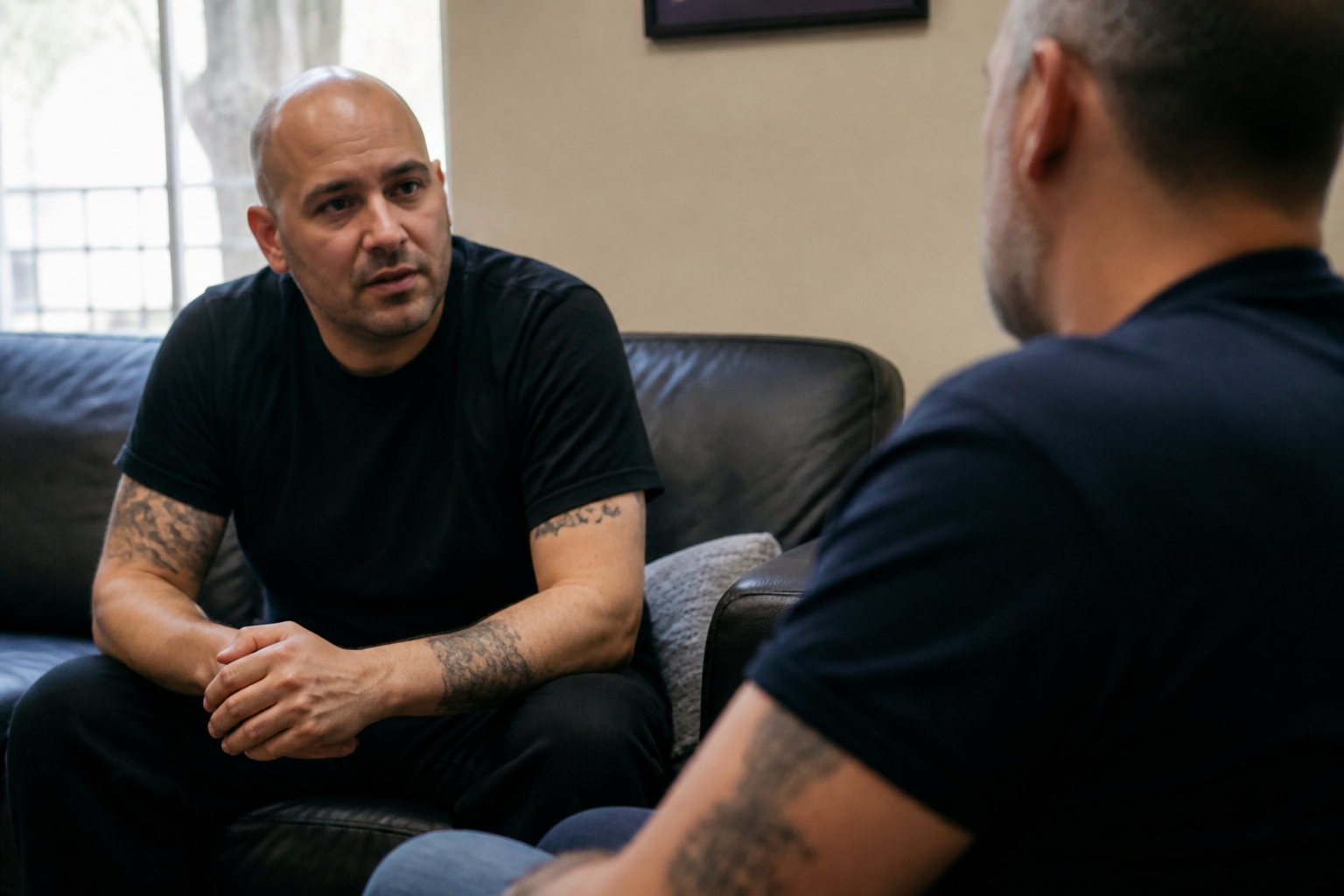 Participant talks with a 2d Chance mentor about sobriety and honesty in recovery in Las Vegas.