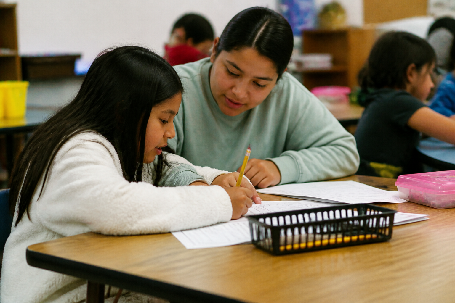 Students and tutors work on language arts and math during after-school tutoring at Blackshear Elementary.